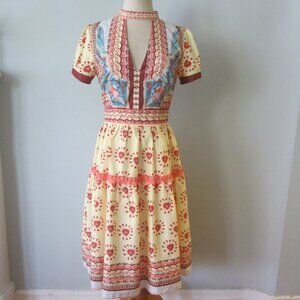 Wild print Fit and Flare Dress in Orange L'Atiste tag on.